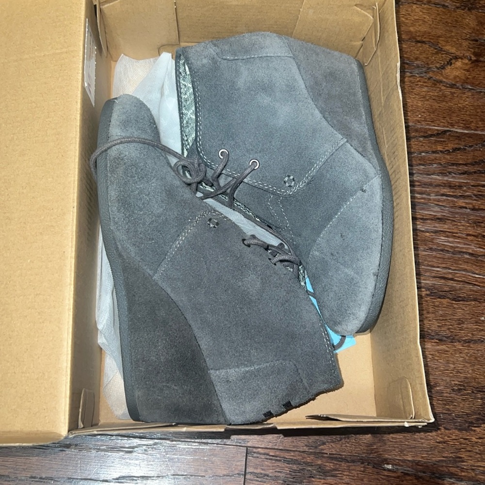 Tom’s Grey Suede Wedge size 7.5. Wore maybe twice very comfy.